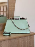 Fendi Peekaboo Mini Handbag in Cuoio Romano leather, featuring iconic twist locks on both sides and a stiff central partition