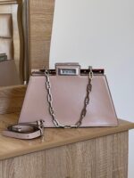 Fendi Peekaboo Mini Handbag in Cuoio Romano leather, featuring iconic twist locks on both sides and a stiff central partition