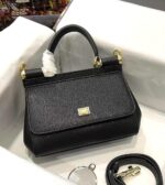 Dolce & Gabbana Sicily Medium Top Handle Bag in black Dauphine leather with structured silhouette and removable shoulder strap