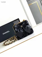 Chanel Sequin Bow Clutch Black Lambskin Tweed with Chain