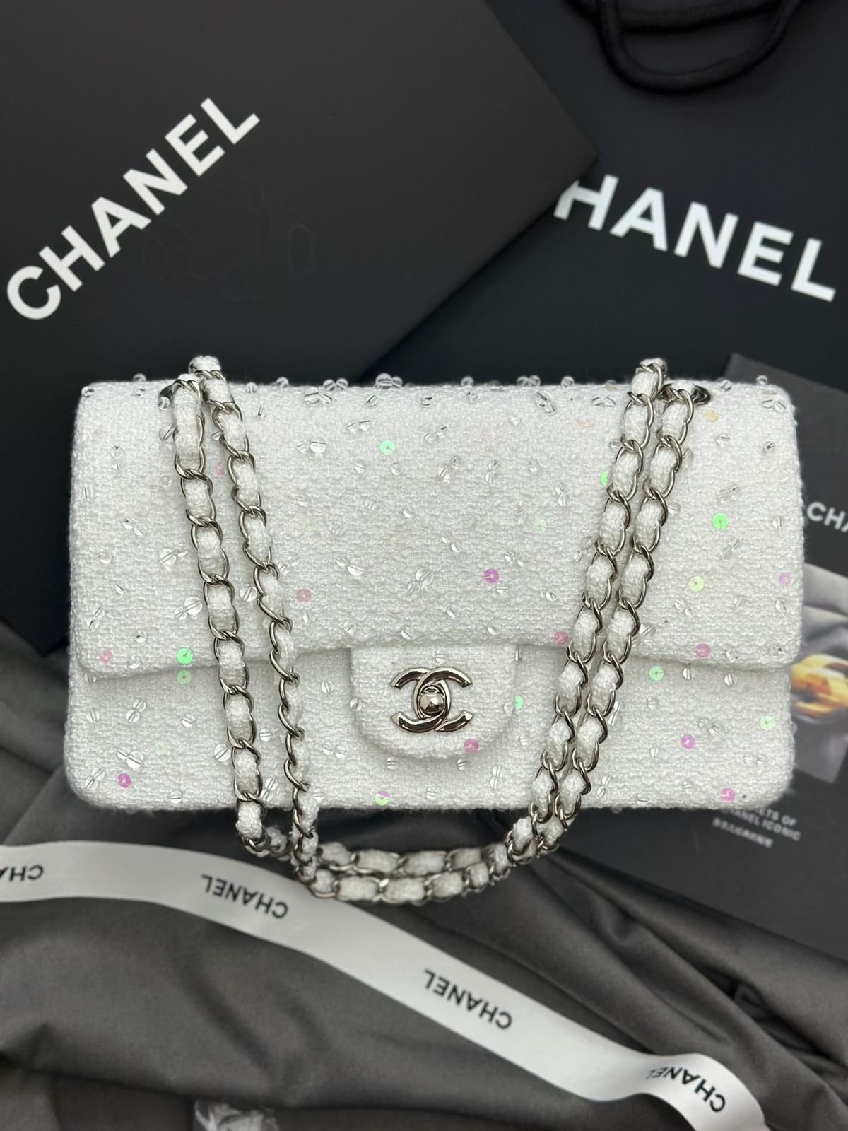 Chanel White Tweed and Sequin Quilted Flap Bag Chanel White Tweed and Sequin Classic Flap Bag with signature quilted texture, CC turn-lock, and gold-tone chain strap