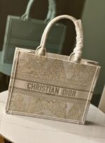 Iconic Dior Book Tote: Embroidered Canvas Masterpiece