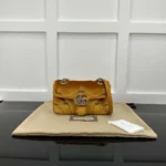 Gucci gg marmont medium shoulder bag - dark gold velvet