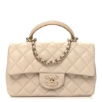Chanel Lambskin Quilted Bi-Color Mini Top Handle Bag