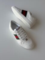 Gucci Athletic Shoes and Sneakers featuring signature Web stripe and interlocking G logo
