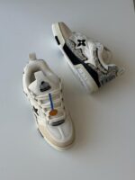 Louis Vuitton LV Skate Sneaker in mixed materials with thick laces and vintage style sole