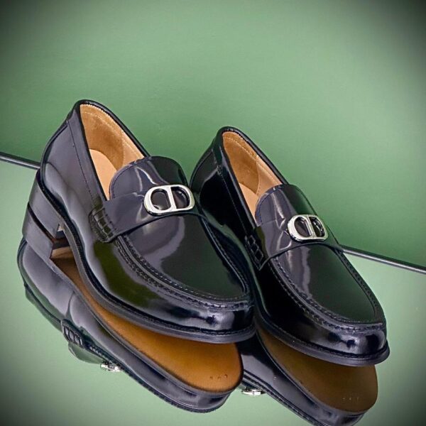 Dior Granville Loafer in black polished calfskin with signature Dior Oblique detail and thick notched sole