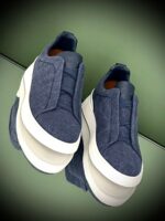 Dark Grey Suede Triple Stitch Sneakers with flexible elastic laces and tonal stitching detail