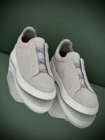 Dark Grey Suede Triple Stitch Sneakers with flexible elastic laces and tonal stitching detail