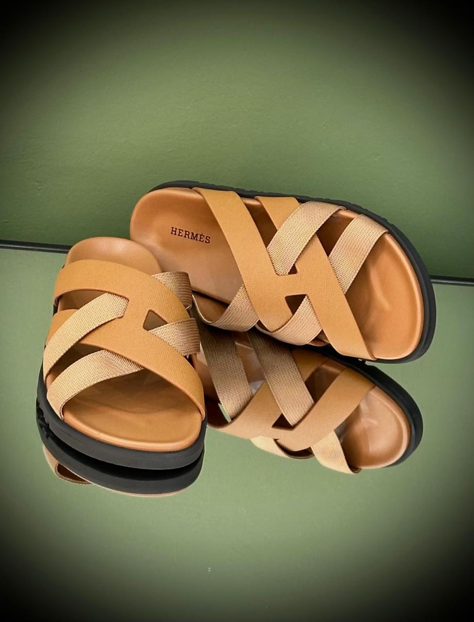 Hermès Kazmir Suede Cross-Strap Men's Slippers Hermès Kazmir Men's Cross Slippers in soft suede leather with signature H-stitching and rubber sole