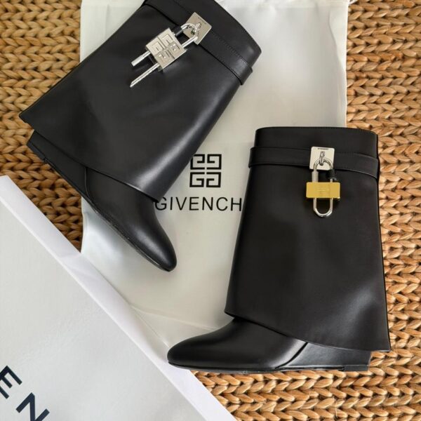 Iconic Givenchy Shark Lock Ankle Boots in black calfskin leather with fold-over shaft and signature 4G padlock