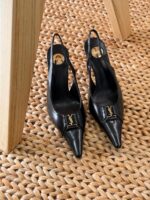 Saint Laurent Babylone Breteuil Slingback Heels in patent leather with pointed toe and YSL metallic plaque