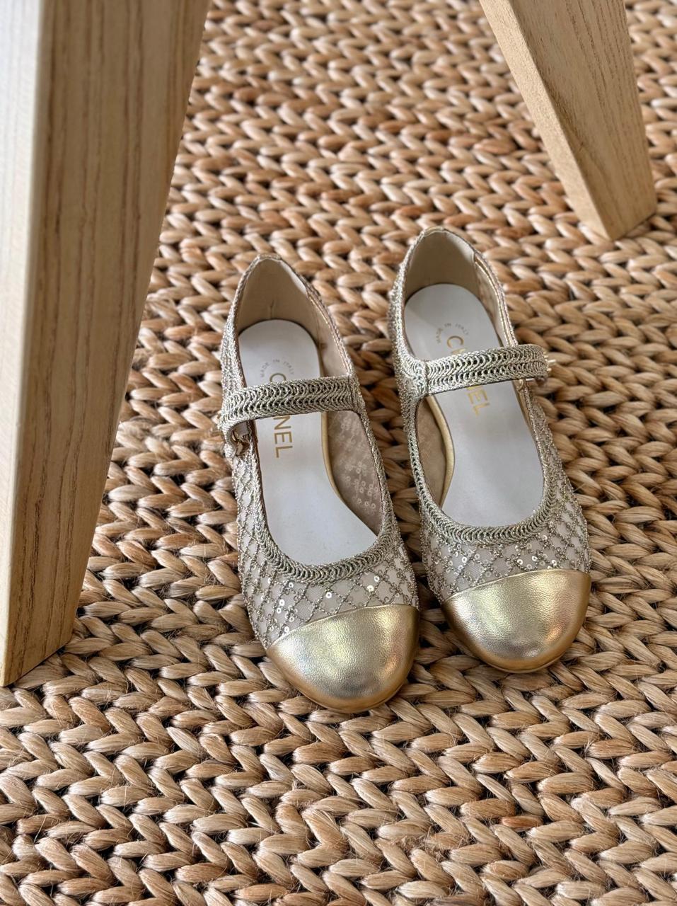 Chanel Iconic Cap Toe Ballerina Flats Iconic Chanel Flat Ballerina Shoes in beige and black lambskin with CC cap toe for the UAE