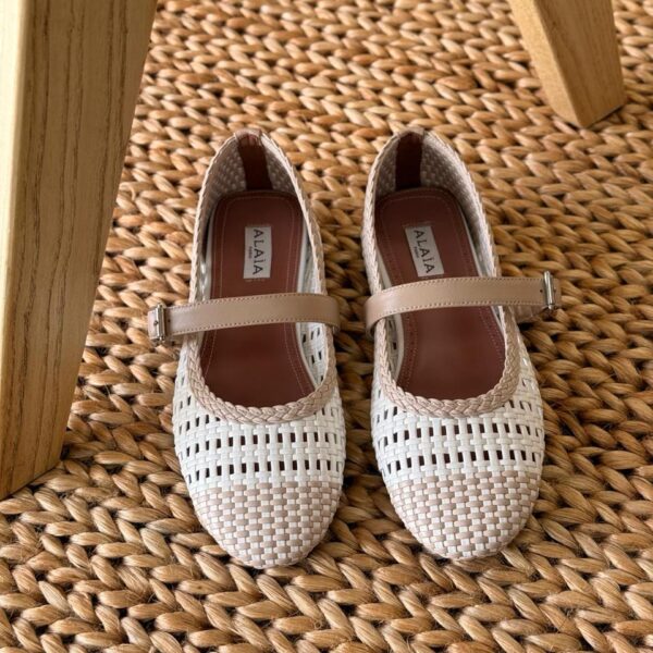 Alaïa Mary Jane Flats with signature woven pattern, delicate ankle strap, and pointed toe