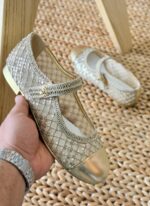 Iconic Chanel Flat Ballerina Shoes in beige and black lambskin with CC cap toe for the UAE