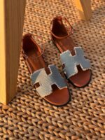 Hermès Santorini sandals with signature H-cutout and adjustable ankle strap