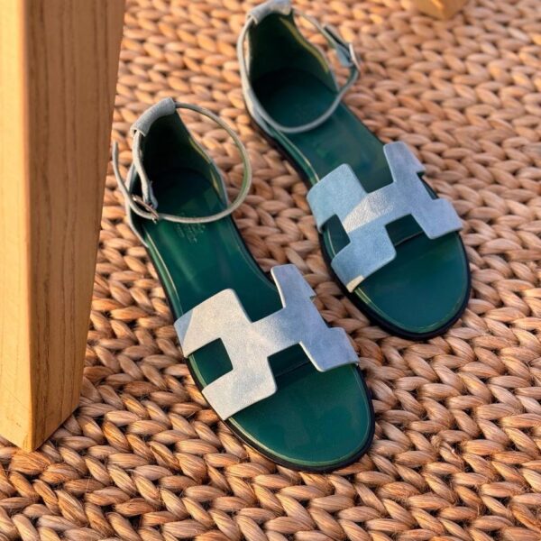 Hermès Santorini sandals with signature H-cutout and adjustable ankle strap