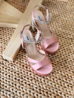 Elegant white satin wedding heels with pointed toe and stiletto heel