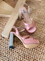 Elegant white satin wedding heels with pointed toe and stiletto heel