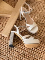 Elegant white satin wedding heels with pointed toe and stiletto heel