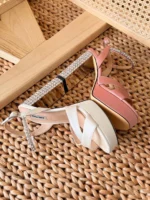 Elegant white satin wedding heels with pointed toe and stiletto heel