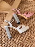 Elegant white satin wedding heels with pointed toe and stiletto heel