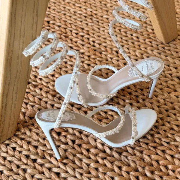 René Caovilla 105mm sandals with pearl and crystal wrap-around serpent straps