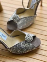 Jimmy Choo Romy pointed-toe stiletto pumps in premium high-shine finish