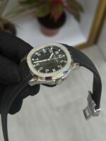 Patek Philippe Aquanaut watch with black embossed dial