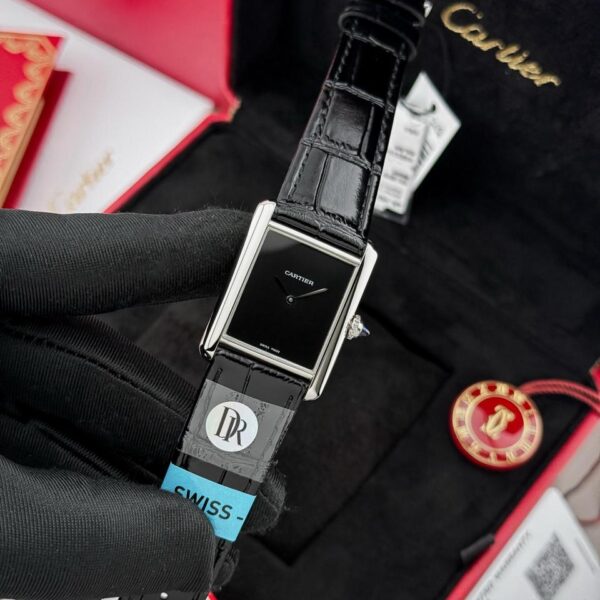 Cartier Tank Must watch with minimalist black lacquered dial and leather strap