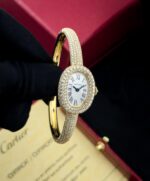 Cartier Baignoire oval watch in 18k gold with diamond-set bezel