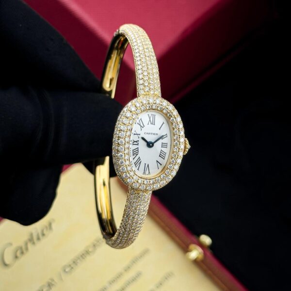 Cartier Baignoire oval watch in 18k gold with diamond-set bezel