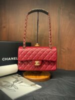 Chanel Medium Classic Flap 25cm bag in black quilted Caviar leather