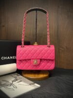 Chanel Medium Classic Flap 25cm bag in black quilted Caviar leather