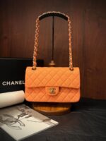 Chanel Medium Classic Flap 25cm bag in black quilted Caviar leather