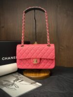 Chanel Medium Classic Flap 25cm bag in black quilted Caviar leather