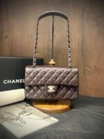Chanel Medium Classic Flap 25cm bag in black quilted Caviar leather